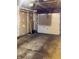 Unfinished garage with concrete floor and bare drywall, ready for storage or conversion at 5212 Mason Cir, Indianapolis, IN 46254