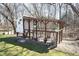 Outdoor chicken coop with a fenced enclosure that provides fresh eggs daily at 6149 W Country Ln, Anderson, IN 46011