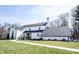 A lovely home featuring manicured lawn and tasteful landscaping at 6149 W Country Ln, Anderson, IN 46011