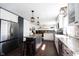 Bright, open kitchen with stainless steel appliances, butcher block island, and hardwood flooring at 6149 W Country Ln, Anderson, IN 46011