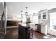 Spacious kitchen with large island, farmhouse sink, and stainless steel appliances at 6149 W Country Ln, Anderson, IN 46011