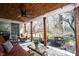 Covered patio with a ceiling fan, outdoor seating, and a view of the backyard at 6149 W Country Ln, Anderson, IN 46011