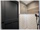Stunning shower featuring subway tile and wood paneling for a rustic and clean design at 6149 W Country Ln, Anderson, IN 46011