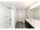 Modern bathroom showcasing a shower-tub combo and stylish vanity at 6216 N Woods Edge Ct, McCordsville, IN 46055