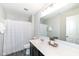 Cozy bathroom features a shower-tub combo, vanity, and new floors at 6216 N Woods Edge Ct, McCordsville, IN 46055