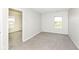 Bright, carpeted bedroom with view of pond and comfortable ambiance at 6216 N Woods Edge Ct, McCordsville, IN 46055
