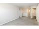 Neutral hallway with carpet, white doors, and walls perfect for customization at 6216 N Woods Edge Ct, McCordsville, IN 46055