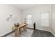 Cozy office featuring modern desk, chair, natural light from two windows, and tasteful décor at 6216 N Woods Edge Ct, McCordsville, IN 46055