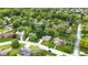 Scenic aerial view of a neighborhood with lush green trees at 629 Williamsburg Ln, Greenwood, IN 46142