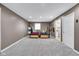 Finished basement with beds, storage, and easy access to the laundry room at 629 Williamsburg Ln, Greenwood, IN 46142