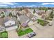 Aerial view of home highlighting the landscaping, driveway, and surrounding neighborhood at 6556 Aintree Ter, Indianapolis, IN 46250