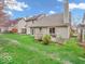 View of the backyard and deck, showcasing the outdoor space, and landscaping at 6556 Aintree Ter, Indianapolis, IN 46250