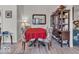 Inviting dining area with seating for four, a stylish table setting, and a charming display cabinet at 6556 Aintree Ter, Indianapolis, IN 46250