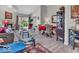 Bright living room with hardwood floors, comfortable seating, and a view of the outdoor scenery at 6556 Aintree Ter, Indianapolis, IN 46250