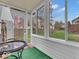 Sunroom with views of the backyard and access to the patio at 6556 Aintree Ter, Indianapolis, IN 46250
