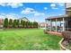 The screened-in porch allows you to enjoy the huge back yard without the bugs! at 6806 Powder Dr, Indianapolis, IN 46259