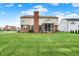 The screened-in porch allows you to enjoy the big backyard in any weather at 6806 Powder Dr, Indianapolis, IN 46259