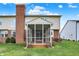 A screened porch on the rear of the home allows enjoyment of the backyard at 6806 Powder Dr, Indianapolis, IN 46259