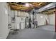 Basement featuring water heater, HVAC system, and other utilities in an unfinished space ready for customization at 6806 Powder Dr, Indianapolis, IN 46259