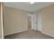 Bedroom with closet and doorway to additional room at 6806 Powder Dr, Indianapolis, IN 46259
