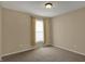 Cozy bedroom with neutral color scheme and carpeted floors at 6806 Powder Dr, Indianapolis, IN 46259