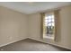 Well-lit bedroom with a large window providing ample natural light, creating an inviting and peaceful atmosphere at 6806 Powder Dr, Indianapolis, IN 46259