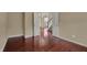 Welcoming entryway showcasing a staircase with white railings and warm, inviting lighting at 6806 Powder Dr, Indianapolis, IN 46259