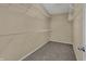 Walk-in closet with carpeted floor and shelving providing ample storage at 6806 Powder Dr, Indianapolis, IN 46259