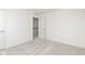 Bright bedroom has neutral carpet and doors leading to other rooms in the home at 6848 Jacone Dr, Brownsburg, IN 46112
