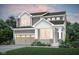 Two-story home featuring attached two-car garage, neutral color palette, and a well-manicured front lawn at 6848 Jacone Dr, Brownsburg, IN 46112