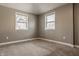 Neutral bedroom featuring carpet, natural light from two windows, and light gray walls at 706 N Euclid Ave, Indianapolis, IN 46201