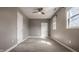 Well lit bedroom featuring carpet, natural light, and a ceiling fan at 706 N Euclid Ave, Indianapolis, IN 46201