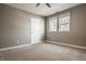 Neutral bedroom featuring carpet, natural light from two windows, and a ceiling fan at 706 N Euclid Ave, Indianapolis, IN 46201