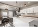 Updated kitchen with stainless steel appliances, white countertops, and a spacious island at 706 N Euclid Ave, Indianapolis, IN 46201