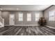 Inviting living room with fresh paint, sleek flooring, and abundant natural light, creating a warm and welcoming atmosphere at 706 N Euclid Ave, Indianapolis, IN 46201