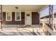 Charming front porch with decorative railing and convenient access to the home's entrance at 706 N Euclid Ave, Indianapolis, IN 46201
