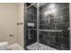 Luxurious shower with stylish black and white tiling and built-in storage at 706 N Euclid Ave, Indianapolis, IN 46201