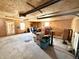 Versatile garage space with plywood walls, concrete flooring, workbenches and good lighting at 75 S 11Th Ave, Beech Grove, IN 46107