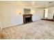 Cozy living room showcasing a fireplace and neutral decor with lots of space at 75 S 11Th Ave, Beech Grove, IN 46107