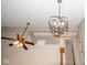 Close up on modern ceiling fan and light fixture at 7837 Hunters Path, Indianapolis, IN 46214