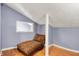 Bonus room with wood floors, neutral walls, and comfortable chaise lounge at 7899 S Timber Cliff Ln, Trafalgar, IN 46181