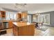 Bright and spacious kitchen with a kitchen island and an adjacent dining area at 7899 S Timber Cliff Ln, Trafalgar, IN 46181