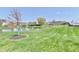 Picturesque backyard with a pond, mature trees, and a gazebo, perfect for relaxation and outdoor enjoyment at 8630 Aylesworth Dr, Camby, IN 46113