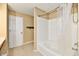 Bright bathroom features a white tiled tub and shower combination with silver fixtures at 8630 Aylesworth Dr, Camby, IN 46113