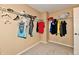 Spacious closet featuring a single rack with hanging clothes and storage on the walls at 8630 Aylesworth Dr, Camby, IN 46113