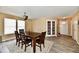 Bright dining area with lots of light and an overhead fan at 8630 Aylesworth Dr, Camby, IN 46113
