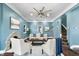 Beautiful living room boasting a fireplace, hardwood floors, and a ceiling fan at 914 Chase St, Anderson, IN 46016