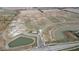 Aerial view of new construction in Saddlebrook Farms North, featuring ponds and planned home sites at 925 Saddlebrook Farms Blvd, Whiteland, IN 46184