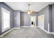 Cozy living room featuring carpeted floors and a ceiling fan at 93 Walnut St, Indianapolis, IN 46227
