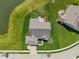 An aerial perspective revealing a spacious backyard deck on this home in a well-developed neighborhood at 9559 Summer Hollow Dr, Fishers, IN 46037